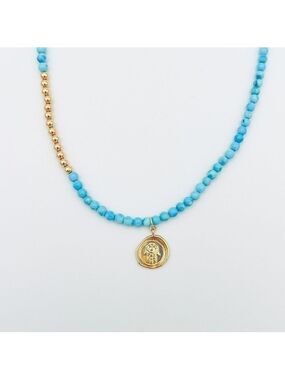 Turquoise choker with gold filled accents and hamsa pendant